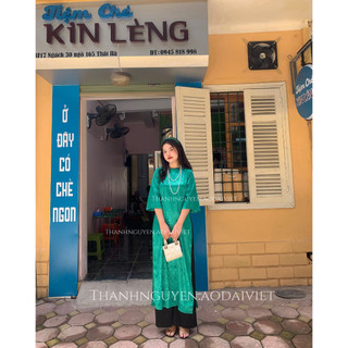 Áo dài Liên Hoa xanh lá dáng suông gấm hoa nổi