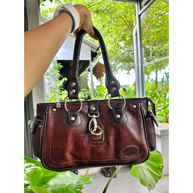 Túi da Cottie có lỗi như hình cuối