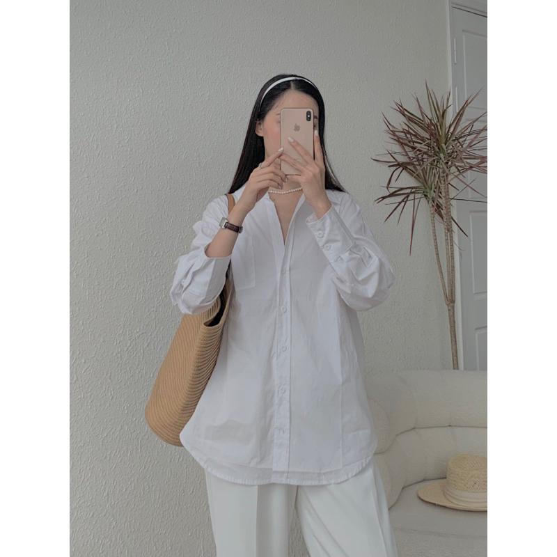 Áo sơ mi xanh pastel