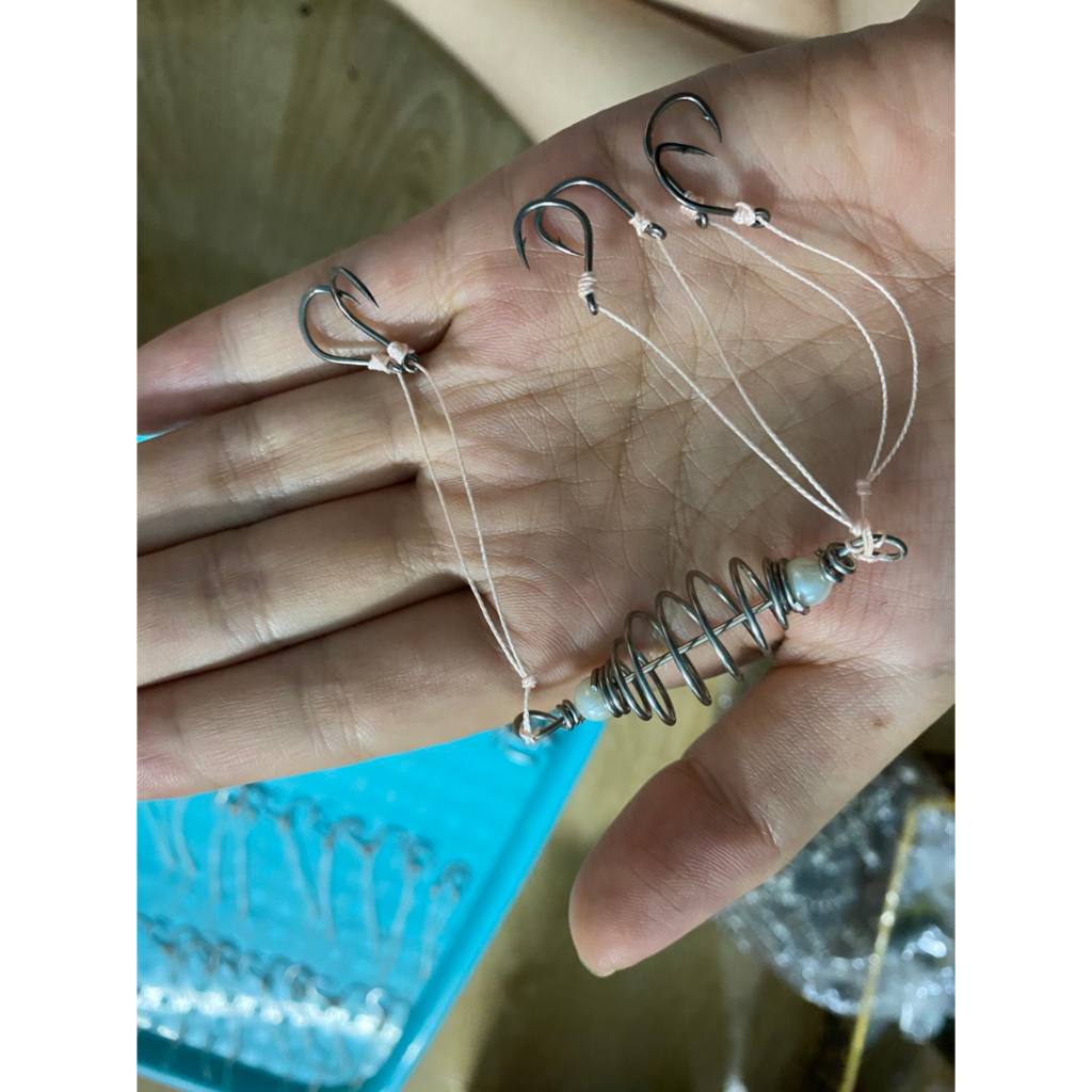 Lò xo lăng xê buộc thủ công bằng  dù id4