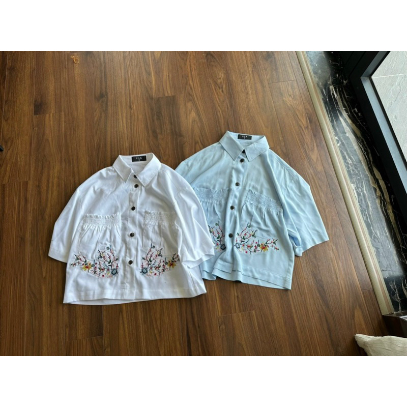 Áo sơmi nữ kiểu vạt ngang cách điệu