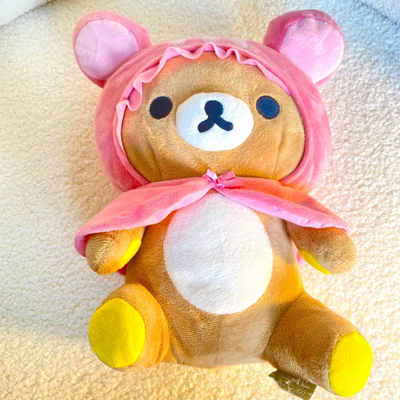 Gấu bông Rila- Rilakkuma Nhật đội mũ và áo choàng hồng