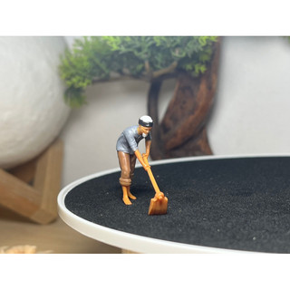 Tượng  nông dân Ông lão cuốc đất và cào lúa