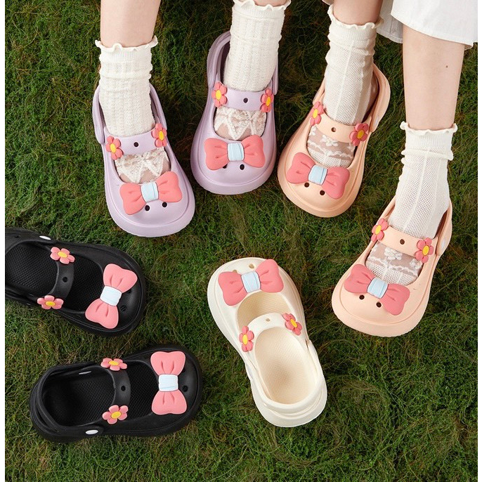 Dép Sục Đính Nơ Lỗ Dễ Thương Mềm Êm Cho Bé Gái