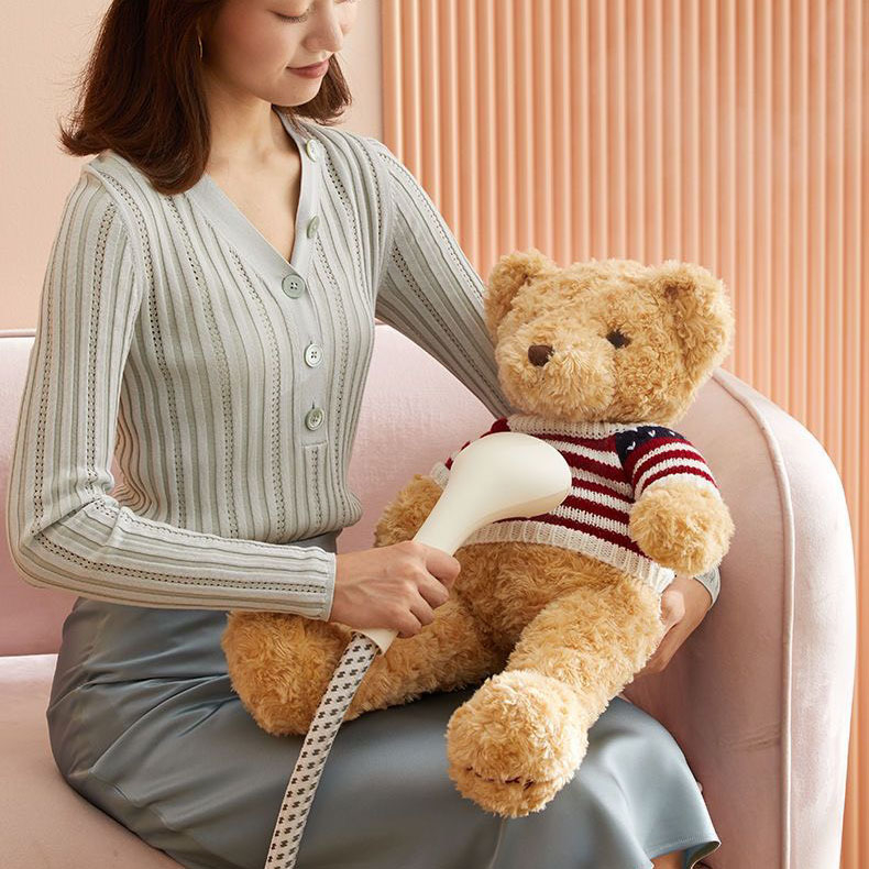 Bàn là cây hơi nước có cầu là BEAR GTJ-B15V1 màu trắng kem bảo hành 12 tháng