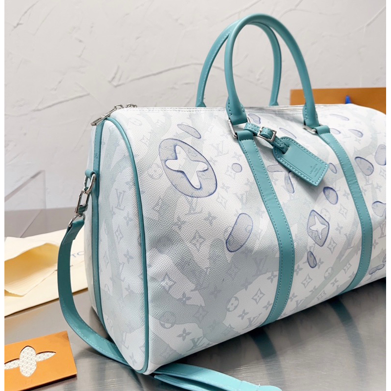 Túi du lịch Keepall45 màu xanh da trời crystal size 45cm da đẹp dustbag M266-45