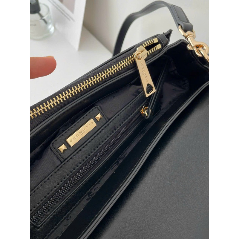 TÚI JOH….N RICHM…..OND