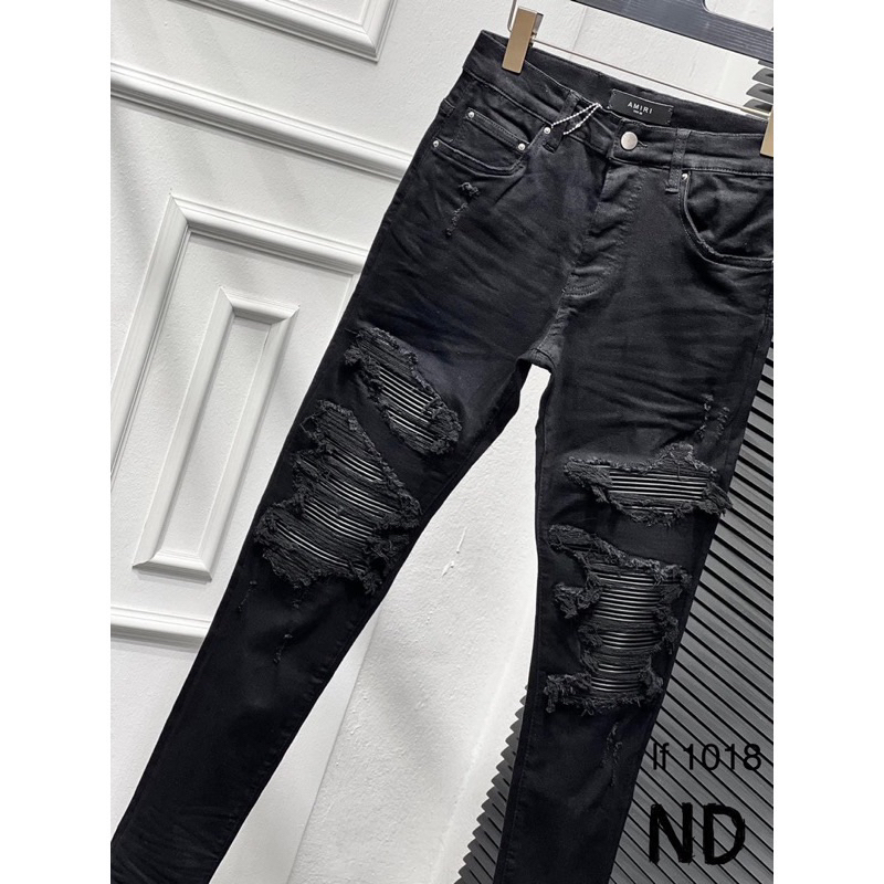 Quần jean bò nam Amiri slimfit black rách xù hai bên đùi vá da nhăn cứng đen phong cách đường phố