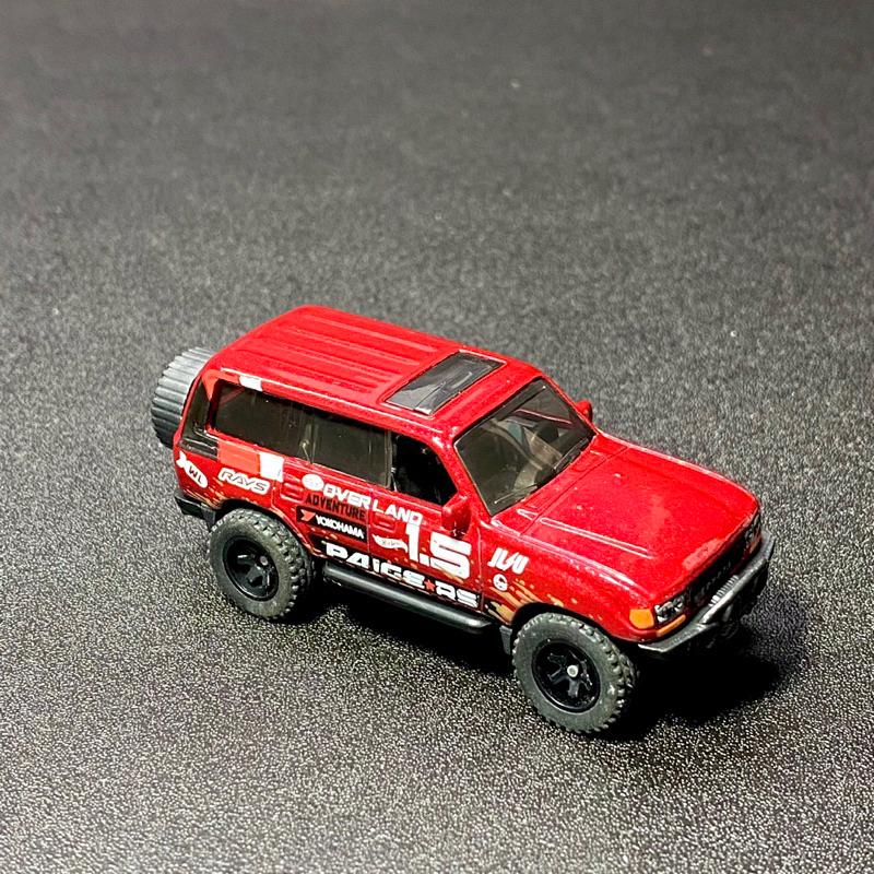 Xe mô hình Hot Wheels không hộp TOYOTA LAND CRUISER 80 Kroger Exclusive bánh cao su - Red - tỉ lệ 1:64