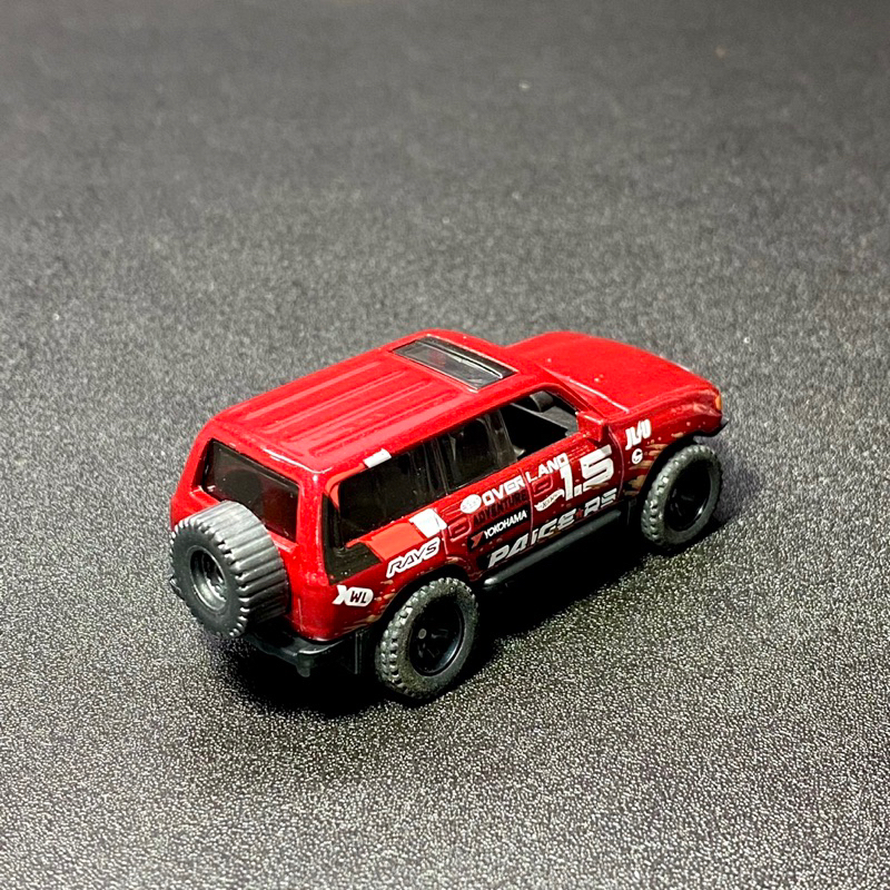 Xe mô hình Hot Wheels không hộp TOYOTA LAND CRUISER 80 Kroger Exclusive bánh cao su - Red - tỉ lệ 1:64