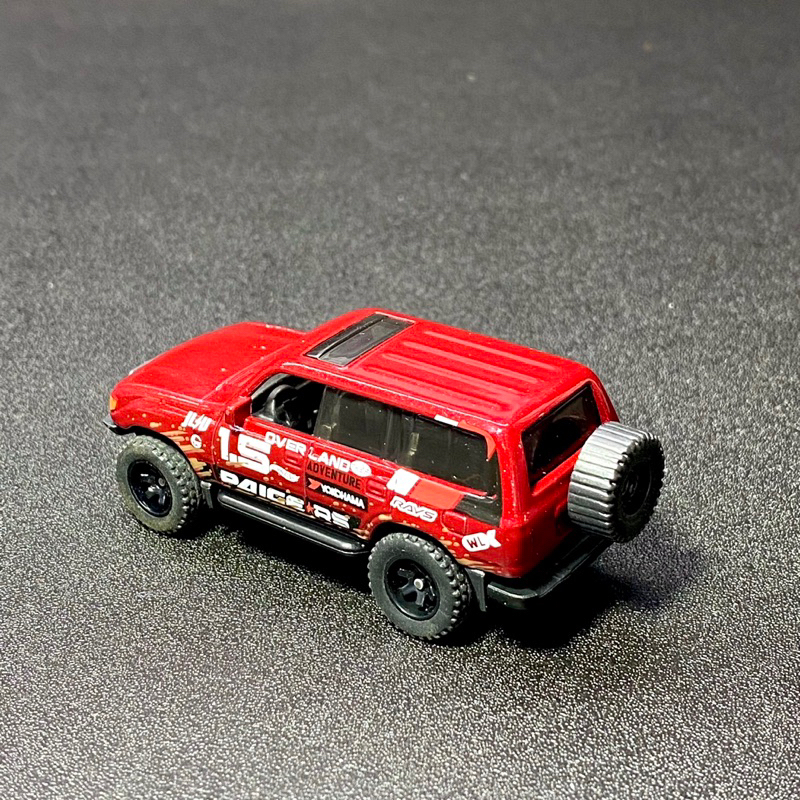 Xe mô hình Hot Wheels không hộp TOYOTA LAND CRUISER 80 Kroger Exclusive bánh cao su - Red - tỉ lệ 1:64