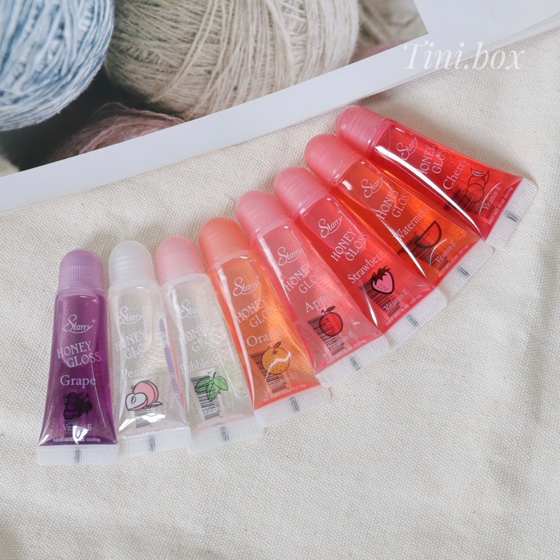 Son bóng dưỡng môi Vitamin E Starry Honey Gloss USA