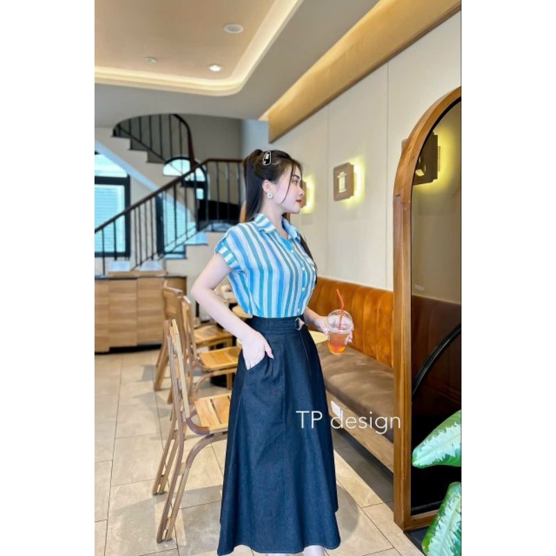 Chân váy jean dáng dài , xòe, có túi