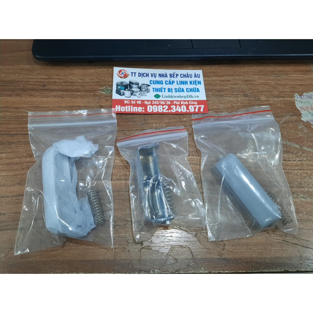 Lẫy nồi cơm/ Nút nhấn mở nồi cơm Toshiba RC-18NMF, RC-10MNF