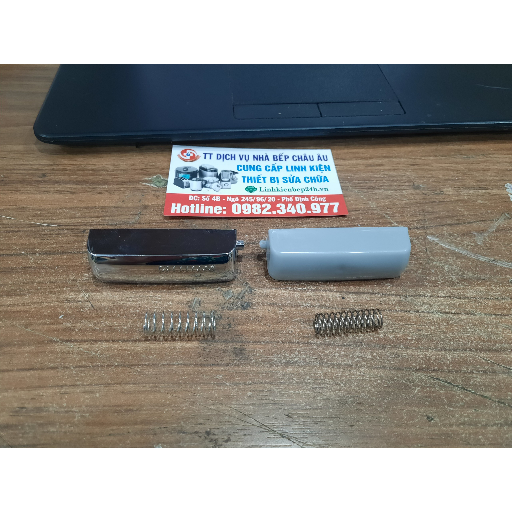 Lẫy nồi cơm/ Nút nhấn mở nồi cơm Toshiba RC-18NMF, RC-10MNF