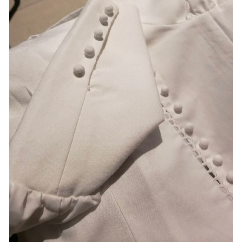 Áo sơ mi gài nút