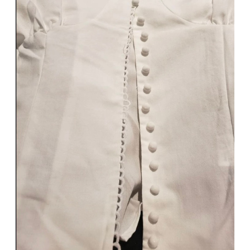 Áo sơ mi gài nút