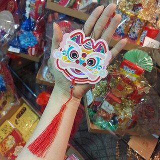 1 cái liễng giấy/ tag đầu lân trang trí/ 2 mặt đầu lân