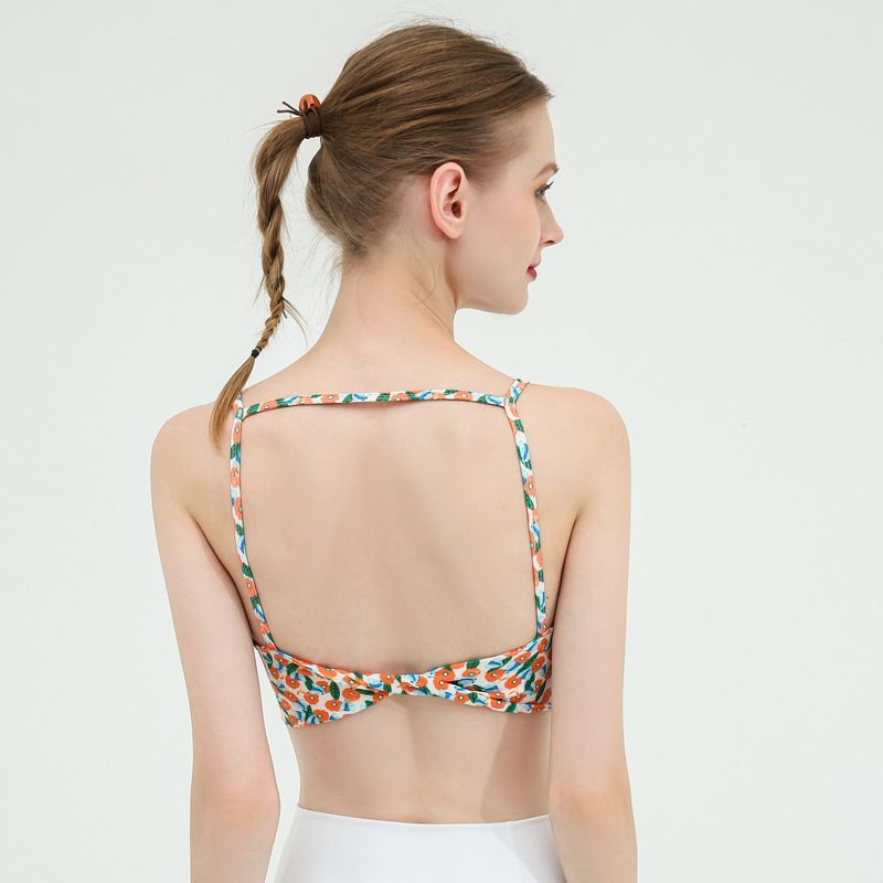 Áo tập yoga tập gym aerobic Quảng Châu cao cấp hoa nhí hở lưng phong cách trẻ trung