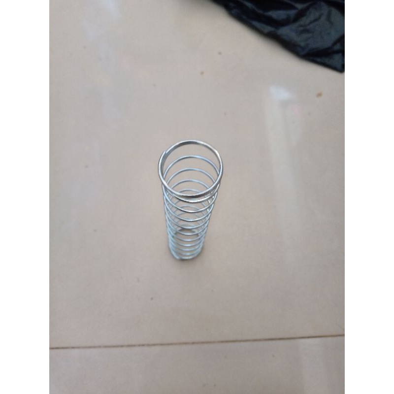 Lò xo ga bình xăng con bông mai