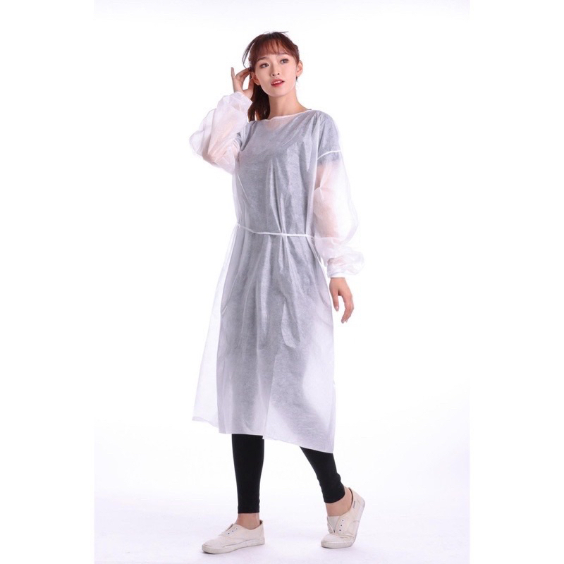 Áo bảo hộ và mũ sâu giúp cố định tóc trong phun xăm