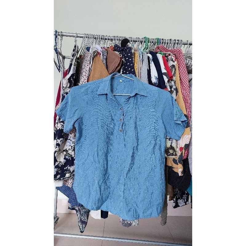 Áo sơ mi màu xanh size L ngực 96cm.