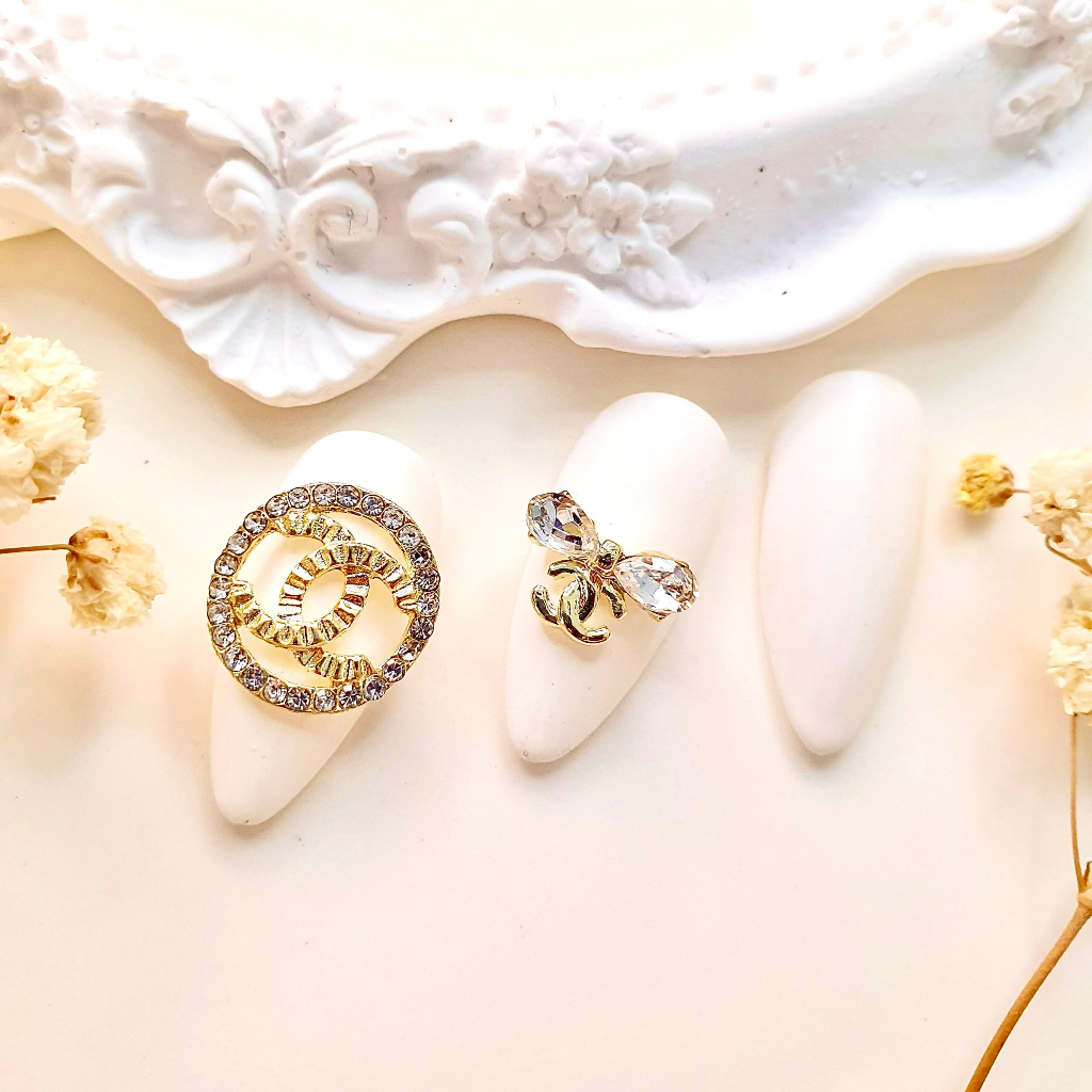Charm logo thương hiệu charm nail charm đá gắn móng tay móng chân Xoài Nail_Bảng 1.1