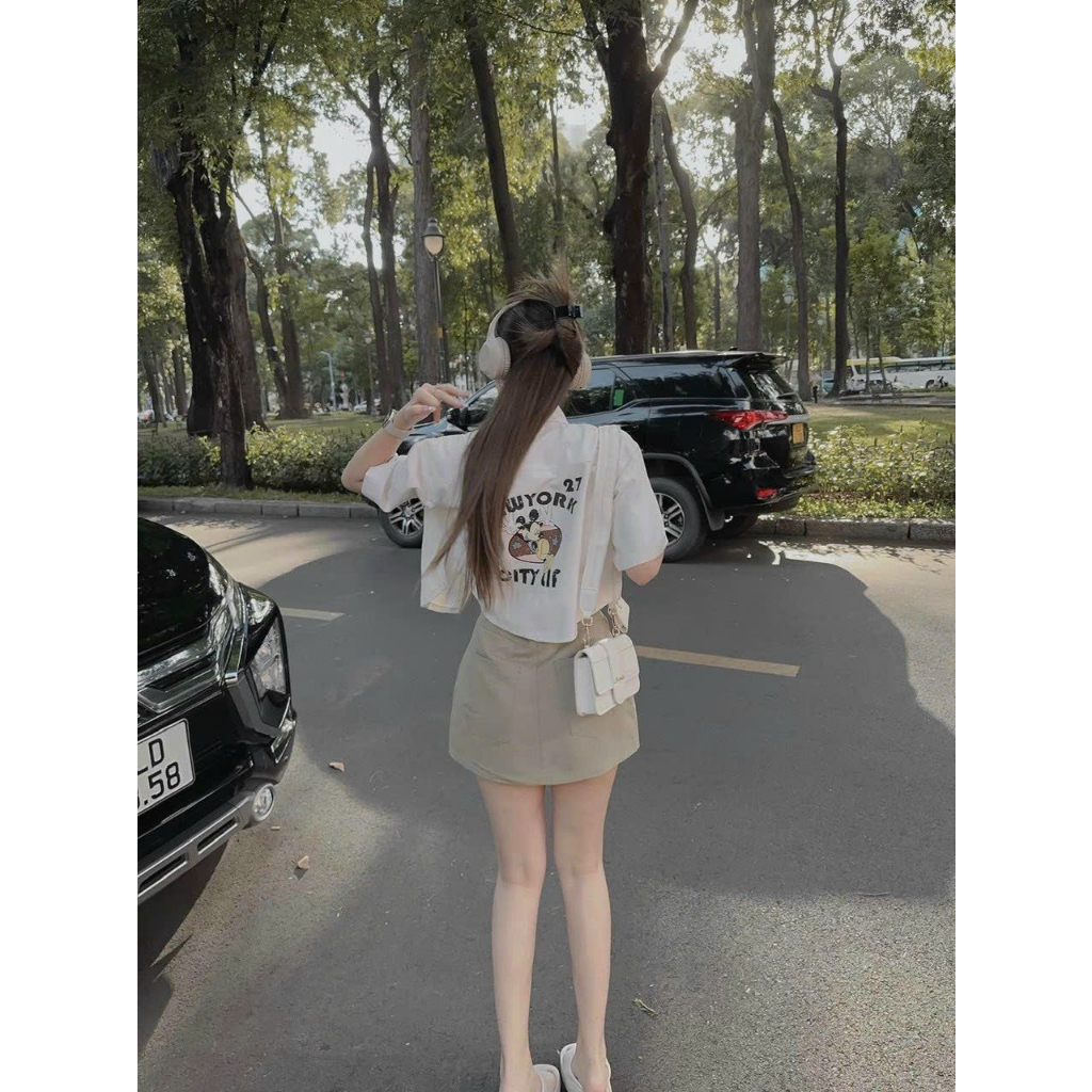 Sét váy nữ mặc đi chơi chất kaki áo khoác sơmi tay ngắn túi giả in hình sau lưng mix chân váy chữ A cài nút kèm áo lót