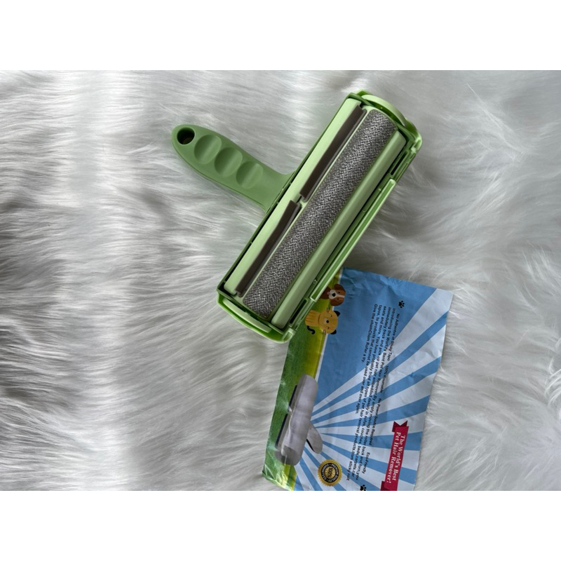 Cây lăn lông tĩnh điện hút sạch lông chó mèo trên bề mặt vải