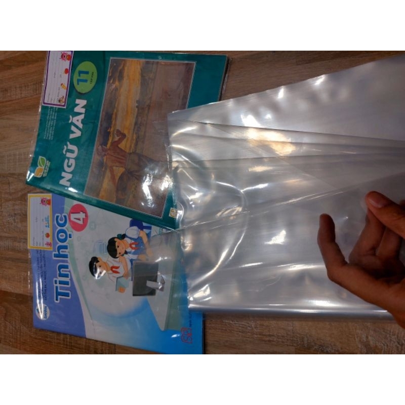 1 TỜ GIẤY BAO SÁCH CẢI CÁCH NILON DÀY BÌNH TÂN - GIẤY BAO KIẾNG 26.7CM BAO SÁCH CẢI CÁCH SẴN KEO KHÔNG HÌNH NAI