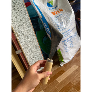 trét lưới hái làm cỏ
