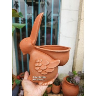 Chậu thú đất nung - chậu chim bồ nông