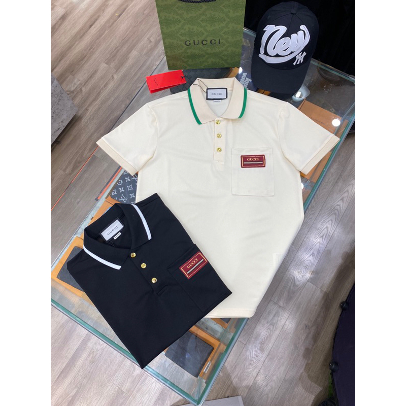 Áo polo G.C hoạ tiết viền cổ xanh cực chất ,có túi áo tiện lời và logo nổi bât ,fom dáng cực chuẩn