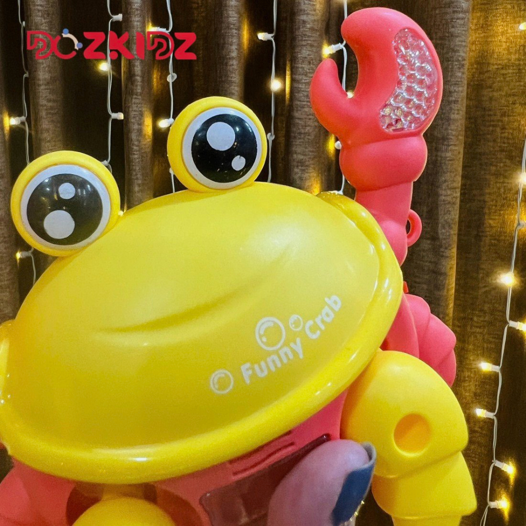 Đồ chơi con cua chạy pin có nhạc có đèn, dây kéo vui nhộn cho bé, hot trend 2023  - Dozkidz