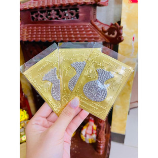 Miếng dán ốp lưng đt hình túi tiền lá yant