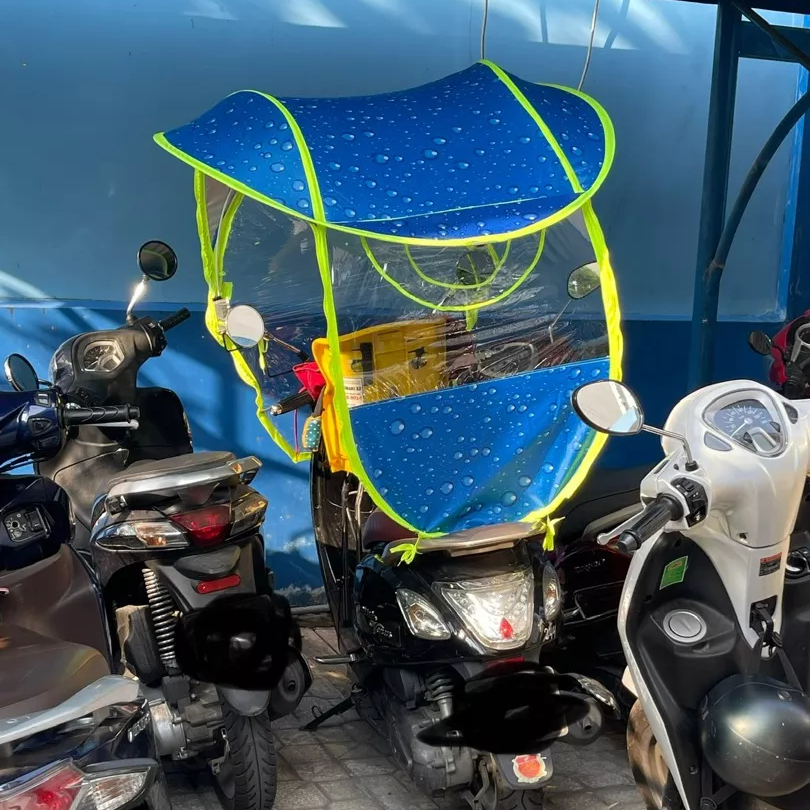 Ô dù đi mưa - sản phẩm che nắng mưa xe máy có rèm 2 bên