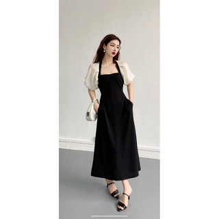Váy đen xốp nổi phối tay bồng