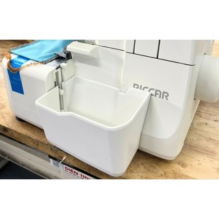 Máng xả vải vắt sổ riccar