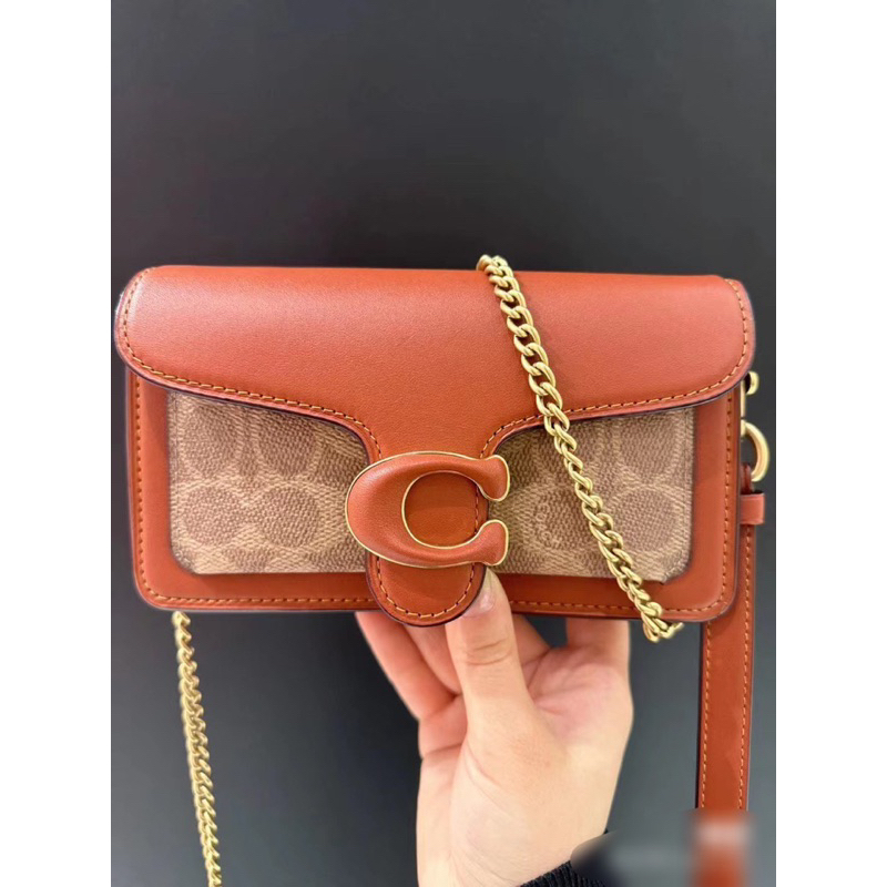 Túi Coach clutch mini