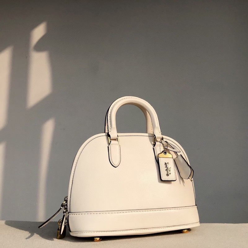 Túi Coach dáng hên