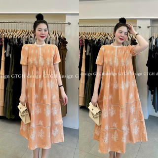 Váy hoa cam xuông dài dập ly ngực tiểu thư