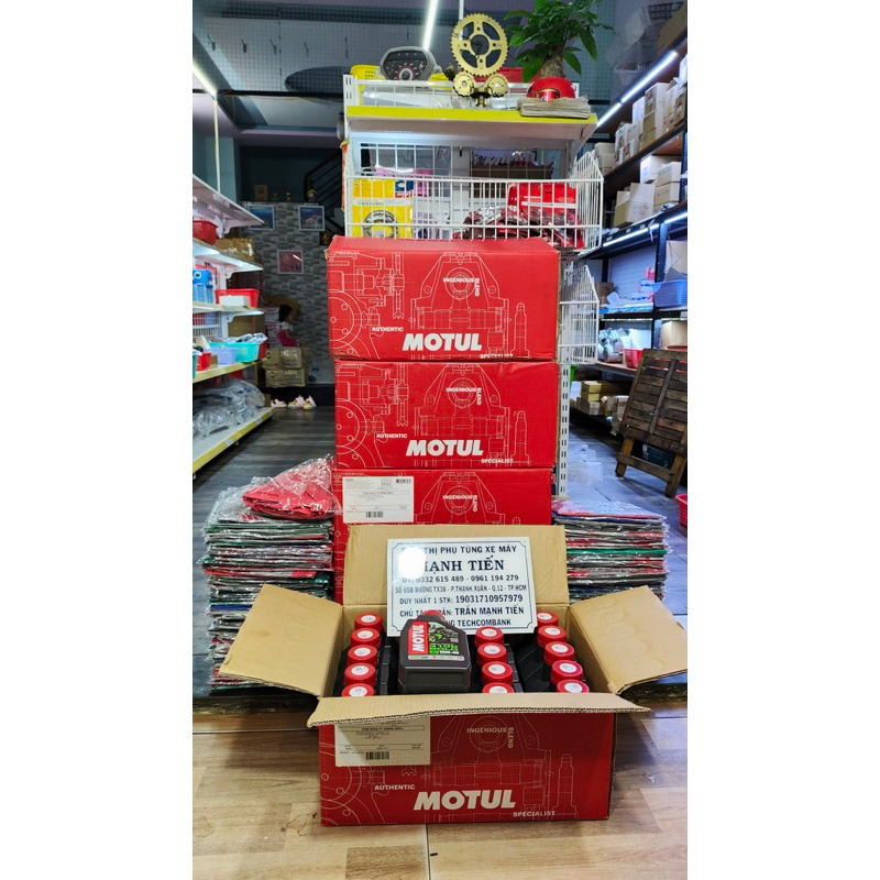 Nhớt motul 3100 GOLD kèm áo mưa