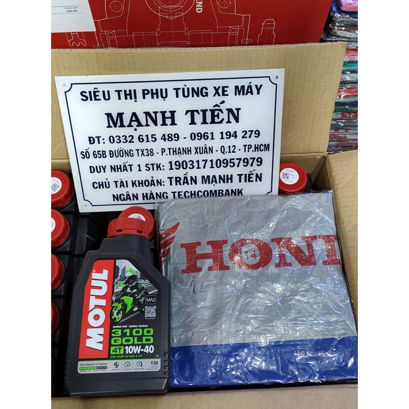 Nhớt motul 3100 GOLD kèm áo mưa