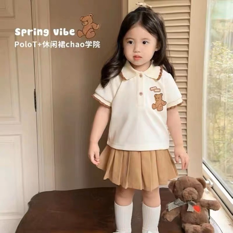 SET ÁO POLO HÌNH CHÚ GẤU CHÂN VÁY KÈM LÓT QUẦN BÊN TRONG