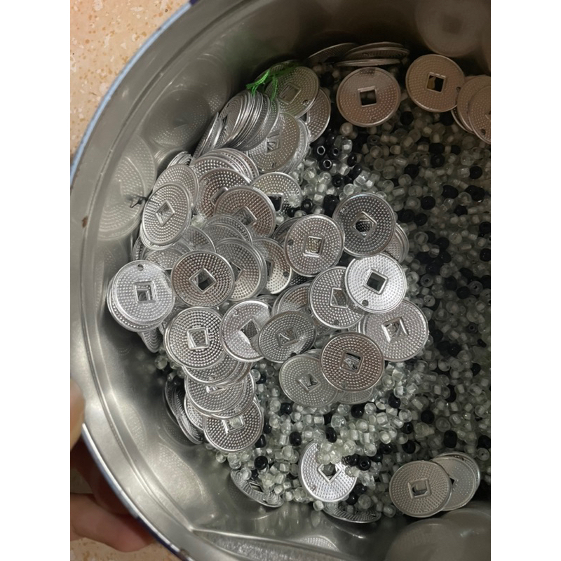 Đồng xèng gắn áo