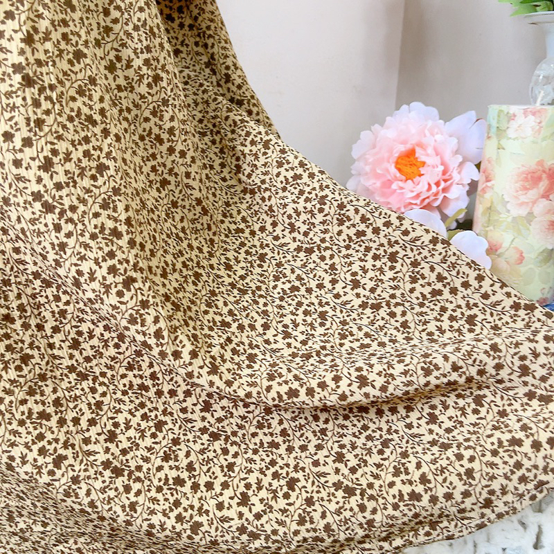 Đầm midi nâu hoa nhí thắt eo