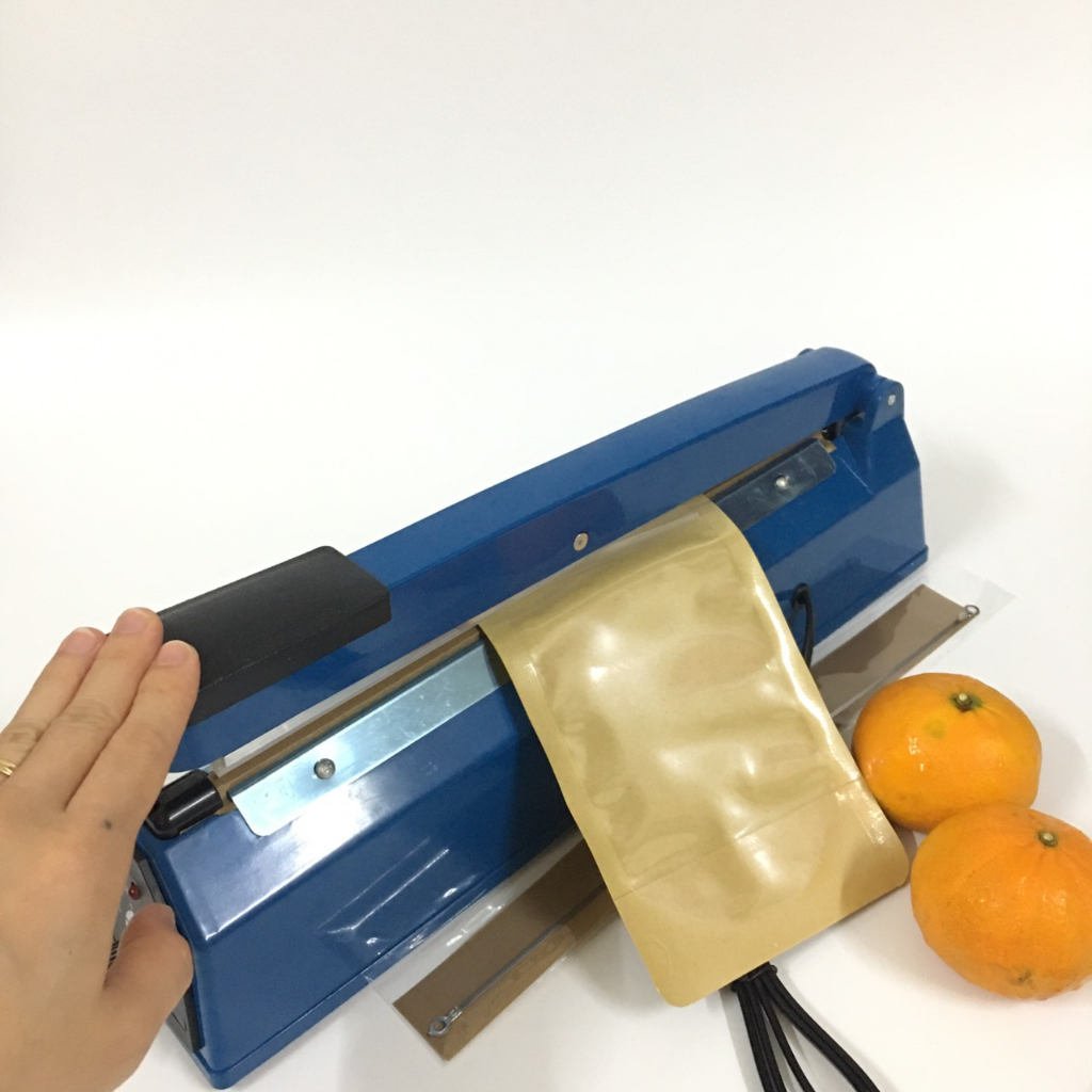 Máy dán, hàn miệng túi nilon đóng gói thực phẩm dập tay - dài 30cm mối hàn 3mm, máy ép túi bóng bền đẹp