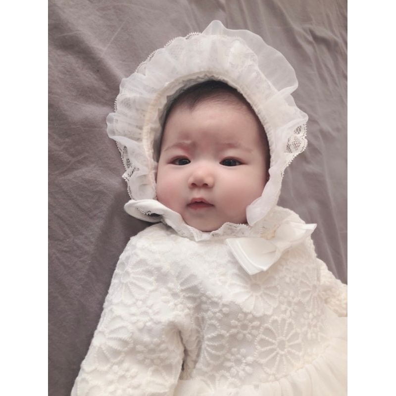 Body váy ren nơ dài tay kèm mũ cho bé từ đầy tháng - 12M