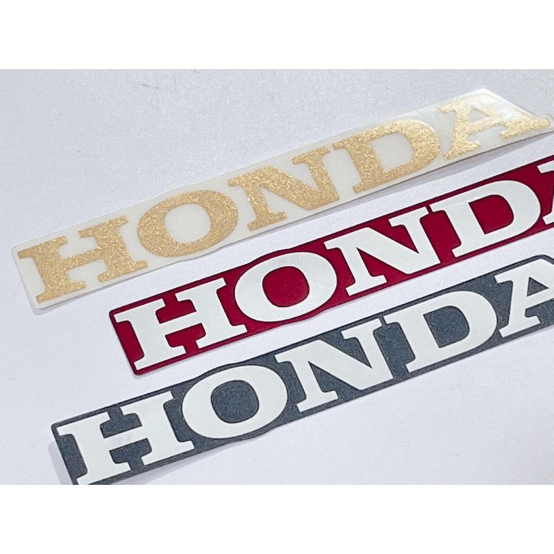 Tem chữ Honda chính hãng TLan 10.2x1.4cm có sẵn keo, dán trang trí xe có 3 màu lựa chọn