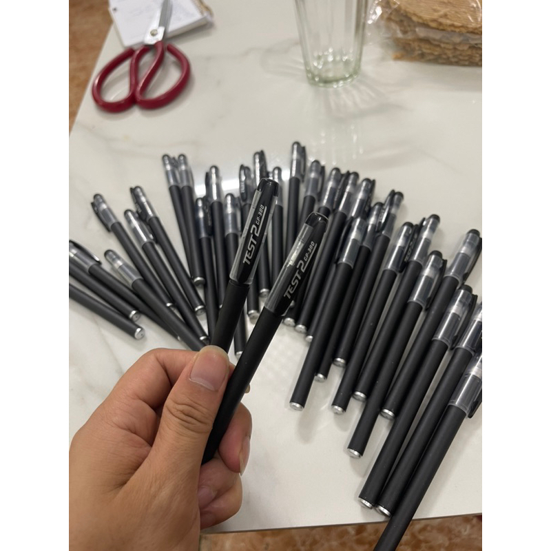 Sét 100 bút gel mực đen ngòi 0.38mm